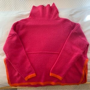 Like new Caryn Lawn Twyla Turtleneck sweater in fuchsia and orange.